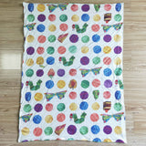 green caterpillar blanket